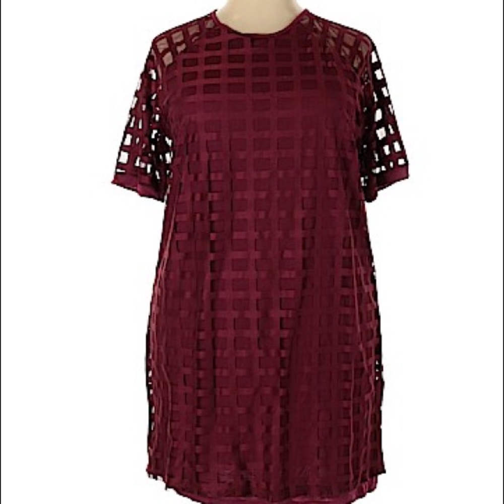 Wine colored, lined with checkered overlay.